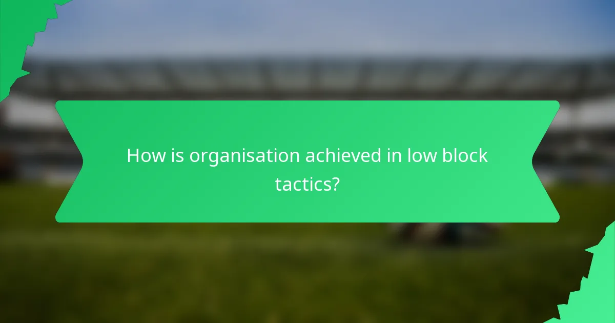 How is organisation achieved in low block tactics?