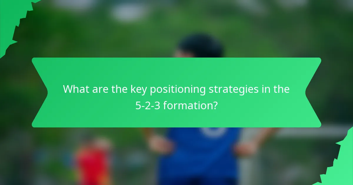 What are the key positioning strategies in the 5-2-3 formation?